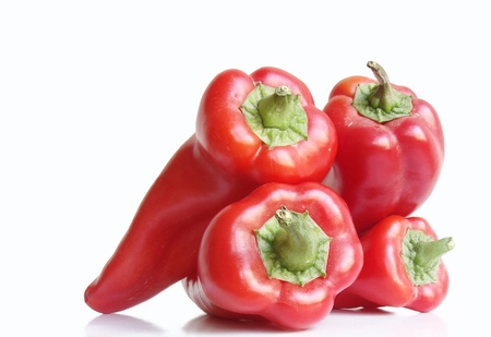 4 isolated red paprika on white background                               
