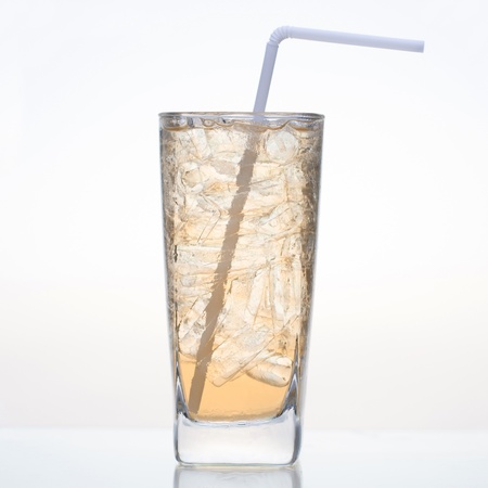 Apple juice a sweet cold drink in glass isolated on white background の写真素材