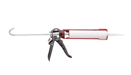 Caulking gun isolated on white の写真素材