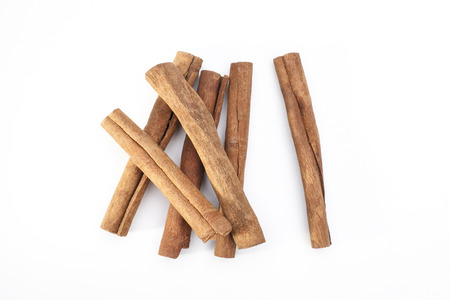 Cinnamon sticks an asian herb for asian cooking food isolated on white background