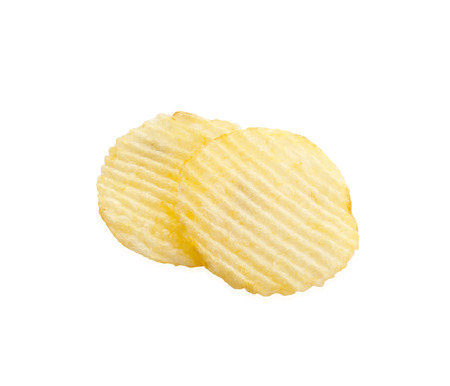 Slice potato chips isolated on white backgroundの写真素材