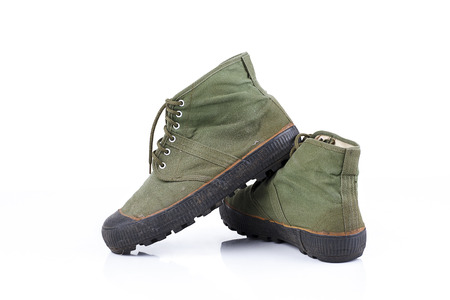 Old style hiking sneaker shoe isolated on whiteの写真素材