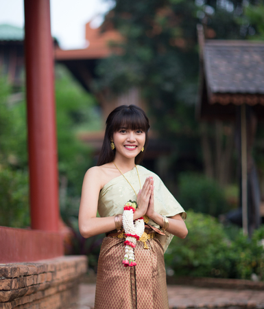 Beautiful and charming young Thai girl with Thai ancient style dressing, Ayutthaya, Thailand の写真素材