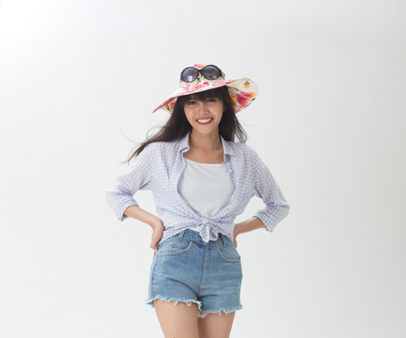 Beautiful Thai girl smiling and joyful her lifestyle on white backgroundの写真素材