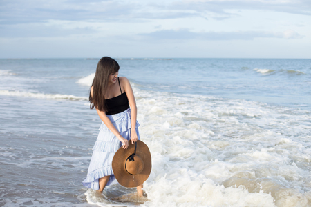 Beautiful girl enjoy and happy her lifestyle in holidayの写真素材