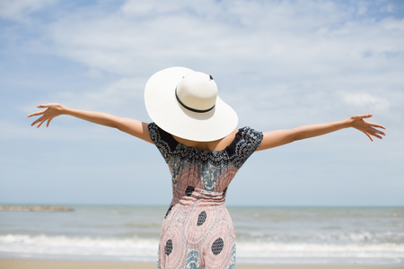 Thai girl enjoy and happy with her relaxing lifestyle in holiday, Thailandの写真素材
