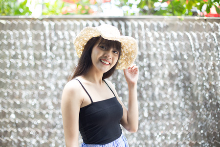 Beautiful girl enjoy and happy her lifestyle in holidayの写真素材