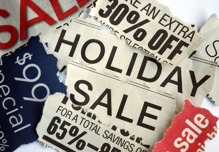 Various holiday on sale signs from the newspapers