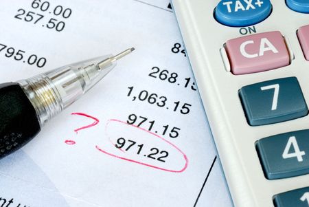 Find a mistake when auditing the financial statement or bank statementの写真素材