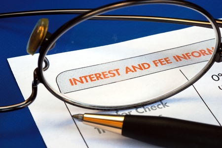 Find out the interest and fee information of an credit card and banking products offerの写真素材