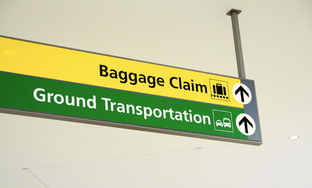 Baggage claim and Ground Transportation sign concept of travelのeditorial素材