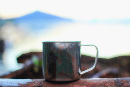 drink cup with mountain backgroundの写真素材