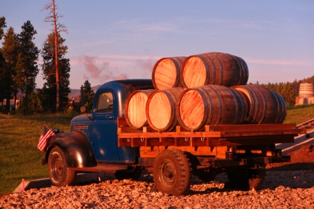 Old truck with wooden barrels の写真素材