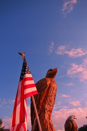 Wood carvings of American Eagles appear to be on guard の写真素材
