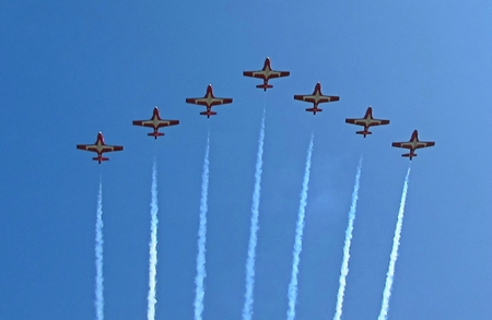 Famous Canadian Snowbirds in flying formation at air show.