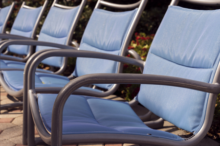 Blue Deck Chairs Near A Pool And Parkの写真素材