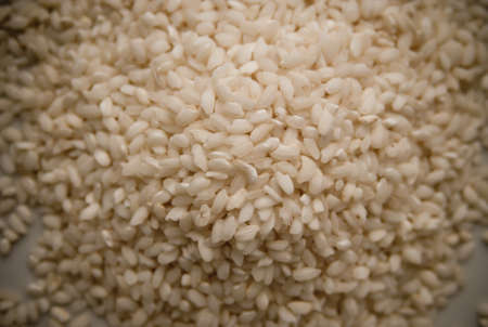 A plate of uncooked Arborio risottoの写真素材