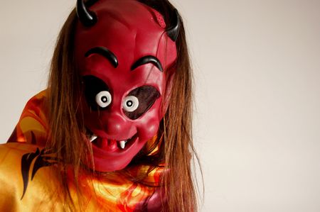 Long hair man in devil mask. Time to Halloween Partyの写真素材