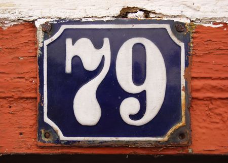 House number tile plaque with floral ornament. の写真素材