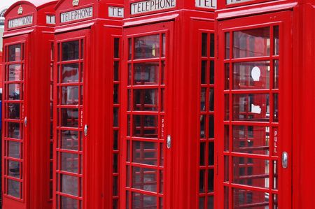 Four classic London telephone cabins. London symbolの写真素材