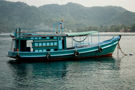  Green fishing boat in Thailandの写真素材