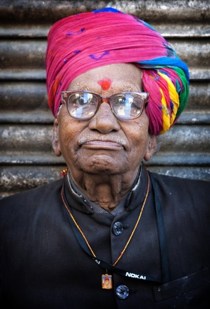 Indian man in colourful turban posing in Jodhpur, India. February 27, 2013のeditorial素材