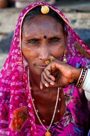 Indian woman in traditional colorful sari portrait Pushkar India. March 3 2013