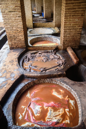 Tannery in the middle of souk in Fez, Morocco. Traditional leather tannery from the 11th century is now biggest tourits attraction in Fes.のeditorial素材