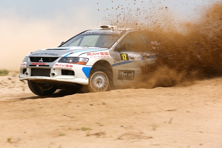 SAFIR, KUWAIT - April 13: A Mitsubishi #12 participates in the Kuwait International Rally organized...