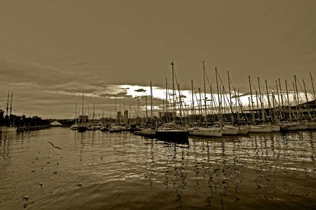 A row of yachts at Port Vell in Barcelona.の写真素材