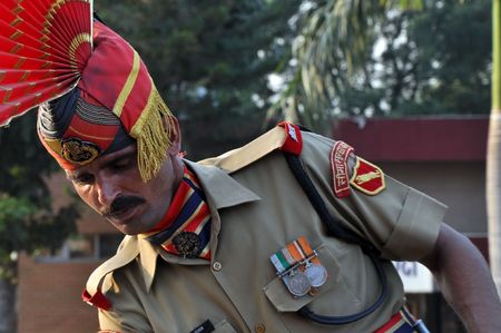 Wagah border, Punjab, India - 25 October, 2009: Member of indian Border security force guards during the everyday ceremonial on indo-pakistan border on October 25, 2009のeditorial素材