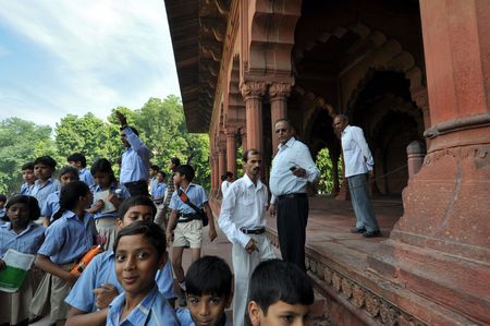 OLD DELHI, INDIA - 24 OCTOBER 2009: An unidentified group of indian pupils enter the Red Fort on October 24, 2009. The Red Fort, a UNESCO World Heritage, is one of the most popular tourist destinations in Old Delhi.のeditorial素材