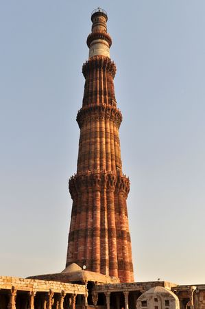 Qutub Minar Tower in Delhi during the afternoon, India.の写真素材