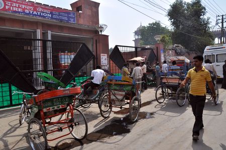 OLD DELHI, INDIA - 24 OCTOBER, 2009: Rickshaw drivers have a rest on their meeting point in Delhi on...