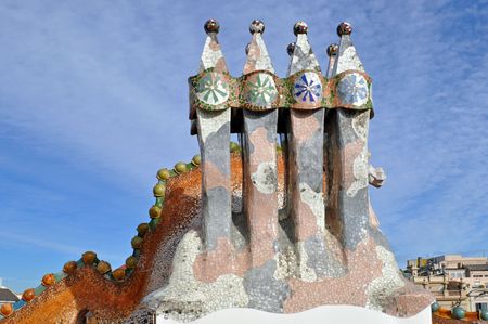 BARCELONA, SPAIN - 30 DECEMBER, 2009:  The arched roof and complex chimney of Casa Batllo on December 30, 2009, a building restored by Antoni Gaudi. The facade is decorated with a mosaic made of broken ceramic tiles.のeditorial素材