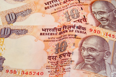 Indian rupee notes with portraits of Gandhi.