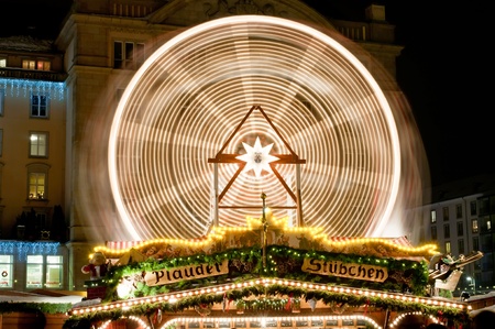 DRESDEN, GERMANY - 20 DECEMBER 2010: Picture of traditional Christmas market in Dresden on December 20, 2010. One of the highlights is a rotating giant wheel.のeditorial素材