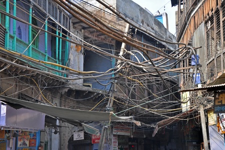 OLD DELHI, INDIA - 24 OCTOBER, 2009: Picture of Indian chaotic electrical wiring in Old Delhi on October 24, 2009. Unsatisfying condition of wiring causes power problems in Delhi.のeditorial素材