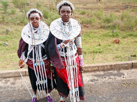 ARUSHA, TANZANIA - 6 JANUARY, 2009: Picture of Maasai girls in traditional clothing on the road to Arusha on January 6, 2009.  The Maasai are the most well known of all African ethnic groups.のeditorial素材