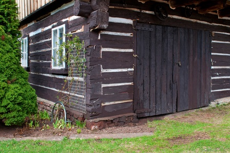 BROUMOV, CZECH REPUBLIC - 12 APRIL 2011: Detail of traditional Czech historic log house on April 12, 2011.のeditorial素材