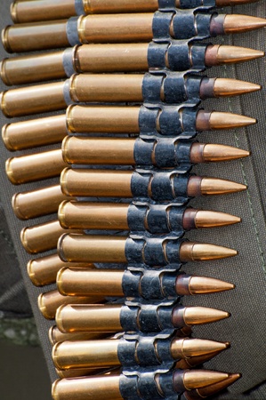 Detail of belt with machinegun cartridges, World War II style.の写真素材