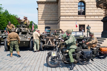 PRAGUE, CZECH REP. - APRIL 29, 2011: Members of Old Car Rangers club in historic American uniforms on April 29, 2011 in Prague, Czech Rep. ItÂ´s part of reenactment event - fall of German army in Prague during WW2. のeditorial素材