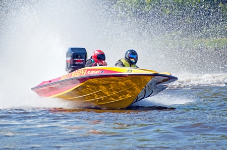 ROUDNICE NAD LABEM, CZECH R. - MAY 7, 2011: Unidentified speedboat driver in action at Roudnicky Trojuhelnik (RT) on May 7, 2011 in Roudnice nad Labem, Czech. RT is one of the biggest jet skis & speedboats competitions in the country.のeditorial素材