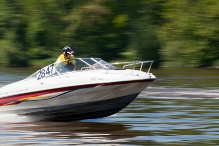 ROUDNICE NAD LABEM, CZECH R. - MAY 7, 2011: Unidentified speedboat driver in action at Roudnicky Trojuhelnik (RT) on May 7, 2011 in Roudnice nad Labem, Czech. RT is one of the biggest jet skis & speedboats competitions in the country.のeditorial素材