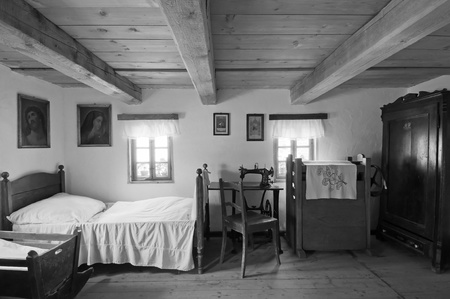 PSTRAZNA, POLAND. - JULY 17: View of interior in an old historic wooden house on July 17, 2011 in Pstrazna, Poland. .のeditorial素材