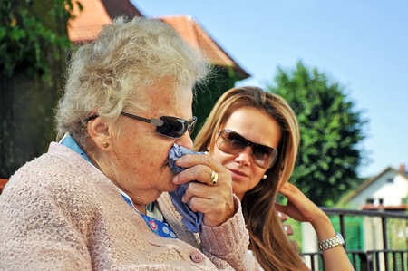 Portrait of grandmother and granddaughter taken in the exterior.の写真素材