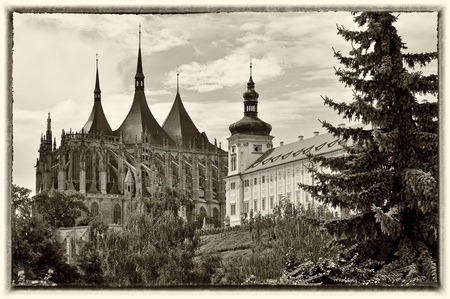KUTNA HORA, CZECH REPUBLIC - AUGUST 12: View of Kutna Hora with Saint Barbara Church that is a UNESCO world heritage site on August 12, 2011 in Kutna Hora, Czech Republic. Retro postcard b&w sepia style.のeditorial素材