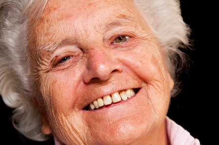Portrait of a senior woman, picture taken during the daytime.