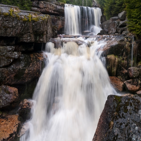 Panoramic view of a beautiful spring waterfall.の写真素材