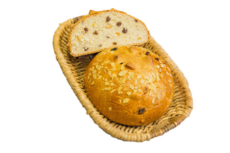 Sweet bread in a basket isolated on a white background.の写真素材